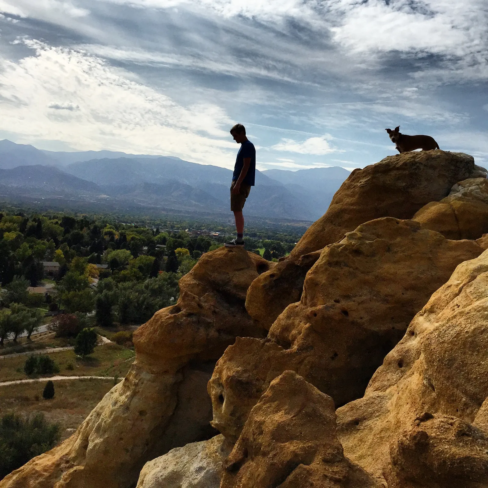 Ryan on rocks overlooking Colorado Springs
