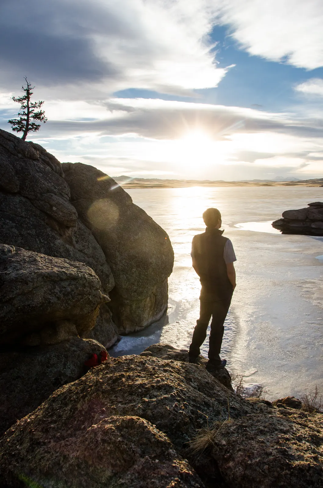 Silhouette by the lake at sunset